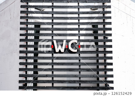 wc inscription on the wooden grate above the toilet entrance wc inscription on the wooden grate above the toilet entrance 126152429