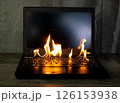 The computer laptop is burning with flames 126153938