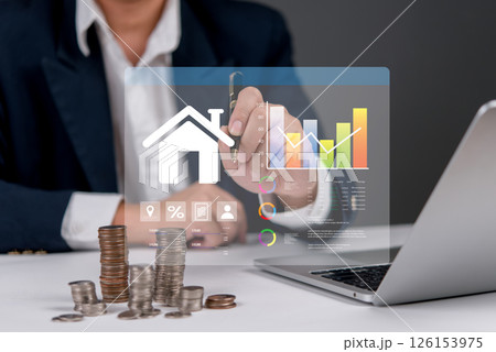 Real estate investment analysis with smart data dashboard, financial chart, and stacked coins, representing housing market, property finance and ROI strategy. 126153975