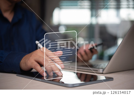 Digital signature on tablet with pen, representing online signing of contracts, legal document approval, e-commerce, and paperless office solution. 126154017