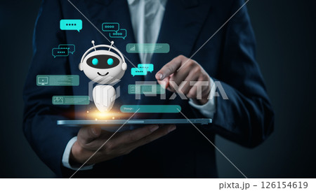 businessman interacting with a digital chatbot on a tablet, symbolizing artificial intelligence, automated customer service, and AI-powered communication. 126154619