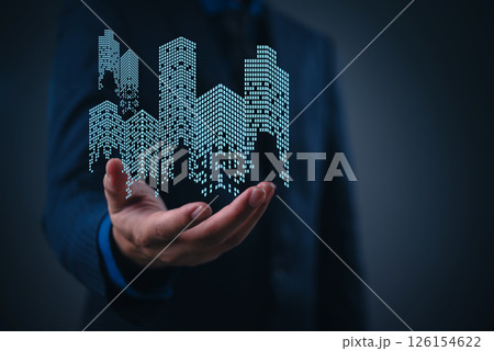 Futuristic real estate concept showing businessman with holographic skyscrapers and virtual buildings, perfect for smart city and business growth topics. Futuristic real estate concept showing businessman with holographic skyscrapers and virtual buildings, perfect for smart city and business growth topics. 126154622