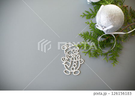 Aesthetic winter scene with a Christmas tree toy and space for text 126156183