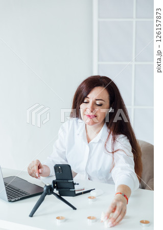 woman working at desk operator remotely online woman working at desk operator remotely online 126157873