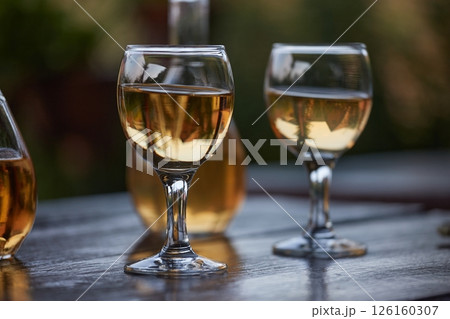 Drinking wine on a summer evening 126160307