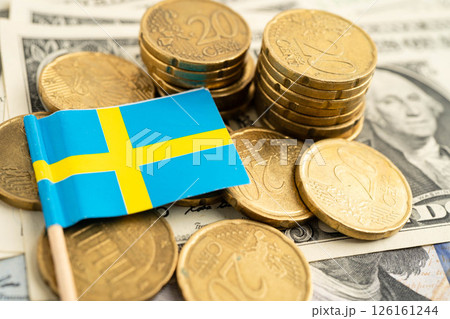 Sweden flag on coin and banknote money, finance trading investment business currency. Sweden flag on coin and banknote money, finance trading investment business currency. 126161244