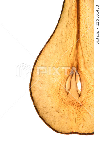 Dried pear on a white background. Slices to the light. Frips. Natural food. Without sugar. 126161433