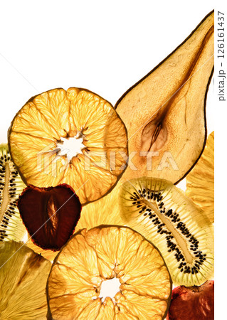 Dried fruit chips on a white background. Diet food. Natural and healthy snacks. Diet chips made from dried fruits. 126161437