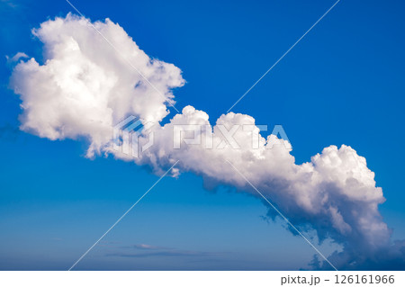 white clouds of different shapes in a blue sky 126161966