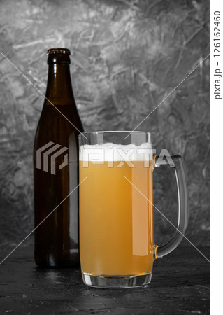 Light beer at Oktoberfest. Glass of beer. 126162460