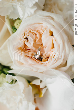Wedding Rings In A Delicate Rose Center Wedding Rings In A Delicate Rose Center 126162994