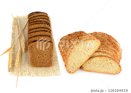 Sliced Freshly baked Bread isolated on white background. Bakery, rustic traditional food concept. 126164419