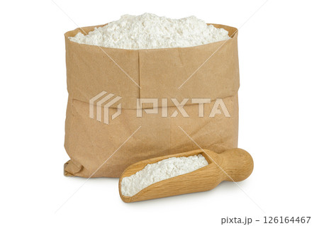 White flour in a paper bag and wooden scoop isolated on white background White flour in a paper bag and wooden scoop isolated on white background 126164467