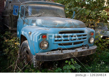 Broken abandoned rusty old vehicle. Retro damaged transportation. 126164614