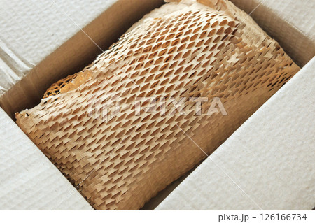 Eco friendly brown paper honeycomb wrap for product packaging parcel carton box Eco friendly brown paper honeycomb wrap for product packaging parcel carton box 126166734