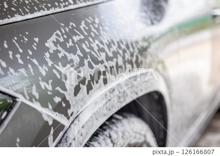 car cleaning and washing with foam soap 126166807