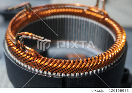 Close up scene the electric motor parts manufacturing process. 126166958