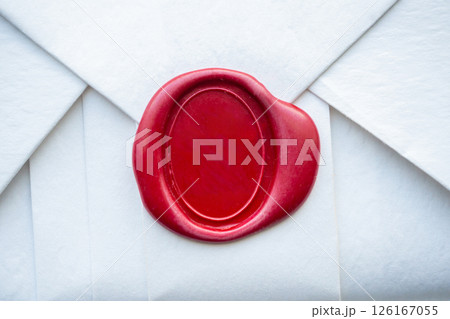 Wax seal stamp on white paper wrap packaging parcel box 126167055