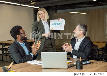 Team of lawyers working together and discussing case details Team of lawyers working together and discussing case details 126167914