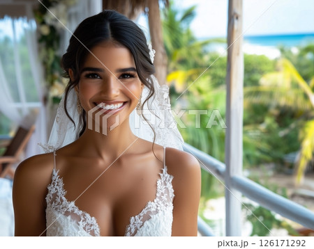 Portrait of bride in white open wedding dress in tropical setting, natural and radiant beauty. Portrait of bride in white open wedding dress in tropical setting, natural and radiant beauty. 126171292