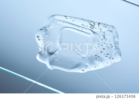 A cosmetic gel swatch on a blue background. 126171436