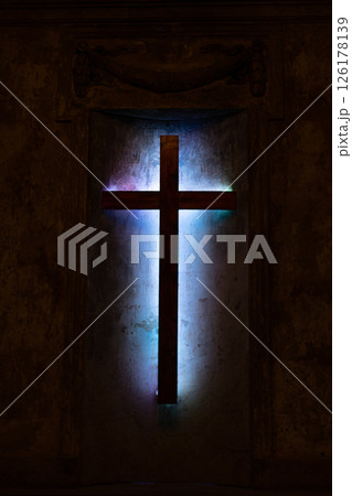 Abstract cross in church on black cement background 126178139