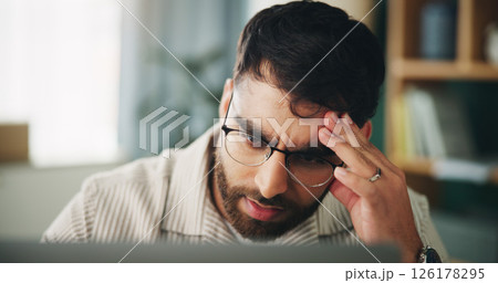 Remote work, man and stress in home with laptop, mistake and project crisis in startup. Entrepreneur, mental health and tech in living room with network error, headache and upset for business debt Remote work, man and stress in home with laptop, mistake and project crisis in startup. Entrepreneur, mental health and tech in living room with network error, headache and upset for business debt 126178295