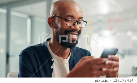 Phone, smile and businessman with social media, texting or message in office laughing at meme. Funny, communication and corporate employee browsing website, mobile or internet app on smartphone Phone, smile and businessman with social media, texting or message in office laughing at meme. Funny, communication and corporate employee browsing website, mobile or internet app on smartphone 126178414