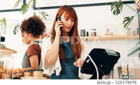 Barista, woman or phone call for cafe order, online management or customer service in store. Small business owner, waiter or manager on mobile for stock inventory, food sale or coffee shop startup Barista, woman or phone call for cafe order, online management or customer service in store. Small business owner, waiter or manager on mobile for stock inventory, food sale or coffee shop startup 126178676