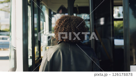 Back, bus stop and enter with woman, travel and morning commute with boarding station. Outdoor, city service and passenger with vehicle trip, public transportation and urban town with journey 126178878