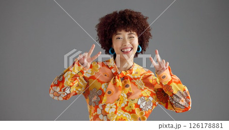 Portrait, peace sign or woman in studio, retro fashion or vintage style on gray background. Happy person, face or model with hand gesture, v symbol or emoji with clothing outfit, icon or mockup space 126178881