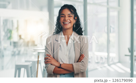 Portrait, smile and confident business woman in corporate office for ambition, finance or investment at venture capital. Happy, professional employee and worker with arms crossed for private equity Portrait, smile and confident business woman in corporate office for ambition, finance or investment at venture capital. Happy, professional employee and worker with arms crossed for private equity 126179090