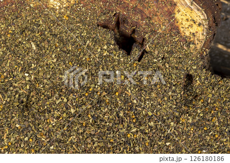 tea leaves, ground and crumbled into very small pieces with the addition of flavoring 126180186