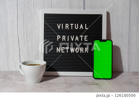 Letter board with text of VIRTUAL PRIVATE NETWORK VPN with mobile phone chroma key green screen mock up template for your copy space app application creation Internet protocols for protection private 126180500