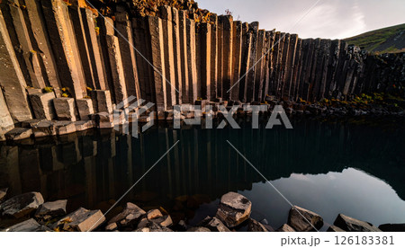 Basalt columns by the river landscape .Background concept. Generated Image Basalt columns by the river landscape .Background concept. Generated Image 126183381
