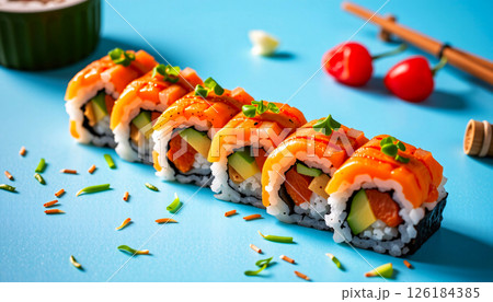 Tempting sushi roll in the fresh corner on a soft blue background Tempting sushi roll in the fresh corner on a soft blue background 126184385
