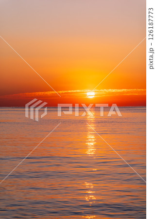 Beautiful red and orange sunrise over the sea. 126187773