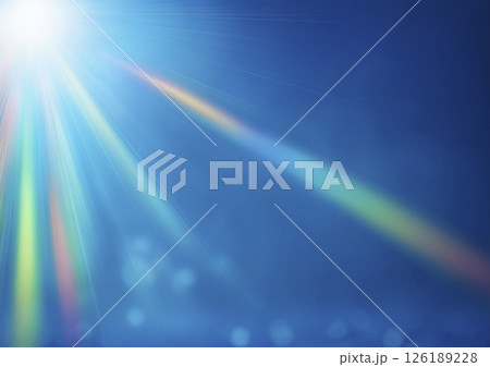 斜め上から虹色の光が差し込む 青背景 斜め上から虹色の光が差し込む 青背景 126189228