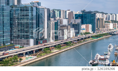 May 11 2025 Modern Urban Cityscape with Elevated Road and Waterfront View 126189266