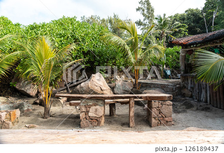 Rustic beach bar on a secluded shore of La Digue Island, Seychelles Rustic beach bar on a secluded shore of La Digue Island, Seychelles 126189437