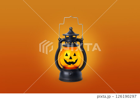 Halloween pumpkin lamp on orange background close up 126190297