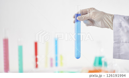 Hands Performing Scientific Experiments in a Modern Laboratory Setting. Hands Performing Scientific Experiments in a Modern Laboratory Setting. 126191994