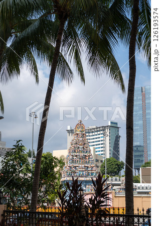 Sri Srinivasa Perumal Temple surrounded by buildings and palm trees in Singapore 126193574