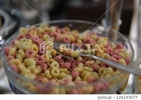 Bowl of Whole Grain Cereal rings isolated on white background Bowl of Whole Grain Cereal rings isolated on white background 126193677