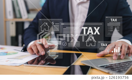 Tax documents and savings, Corporate and individual tax payment concept, VAT of business, Submit request refund tax, Businessman using computer filling out corporate and personal income tax return. 126193756