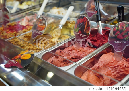 Variety of Gelato Flavors on Display in Ice Cream Shop 126194685