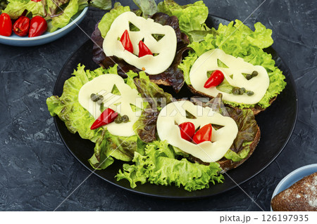 A group of sandwiches with Halloween decorations. A group of sandwiches with Halloween decorations. 126197935