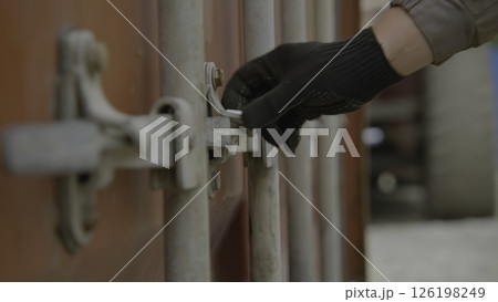 A Detailed Close Up View of the Locking Mechanism Found on Cargo Shipping Containers. Stock Footage A Detailed Close Up View of the Locking Mechanism Found on Cargo Shipping Containers. Stock Footage 126198249