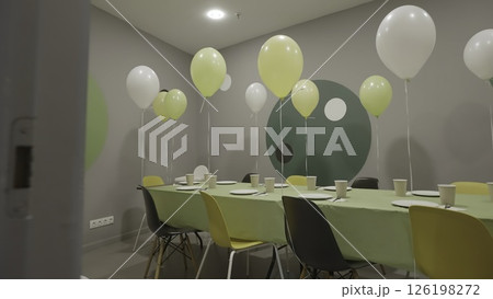 A Vibrant Festive Event Space Adorned with Balloons and Colorful Decorative Elements. Creative A Vibrant Festive Event Space Adorned with Balloons and Colorful Decorative Elements. Creative 126198272