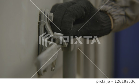 Close up of a metal lock on a storage container, showcasing its design and function. Stock Footage 126198336